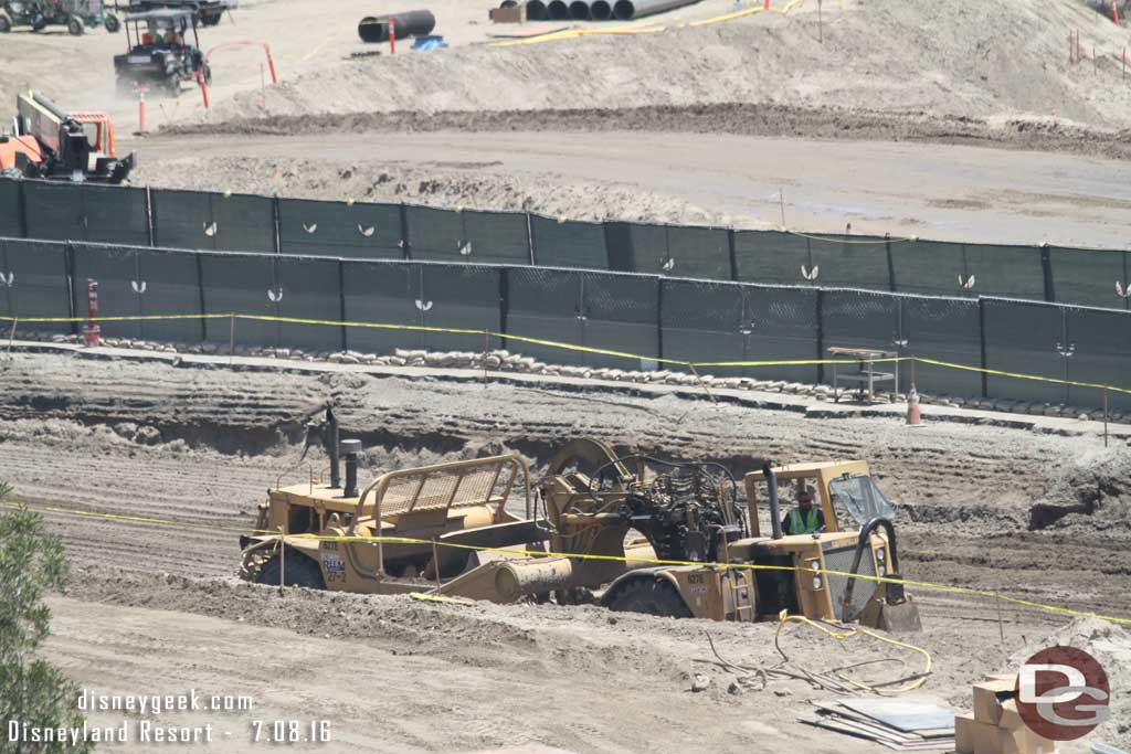 7.08.16 - Here you can see the earth mover in the pit.  It was dumping dirt.
