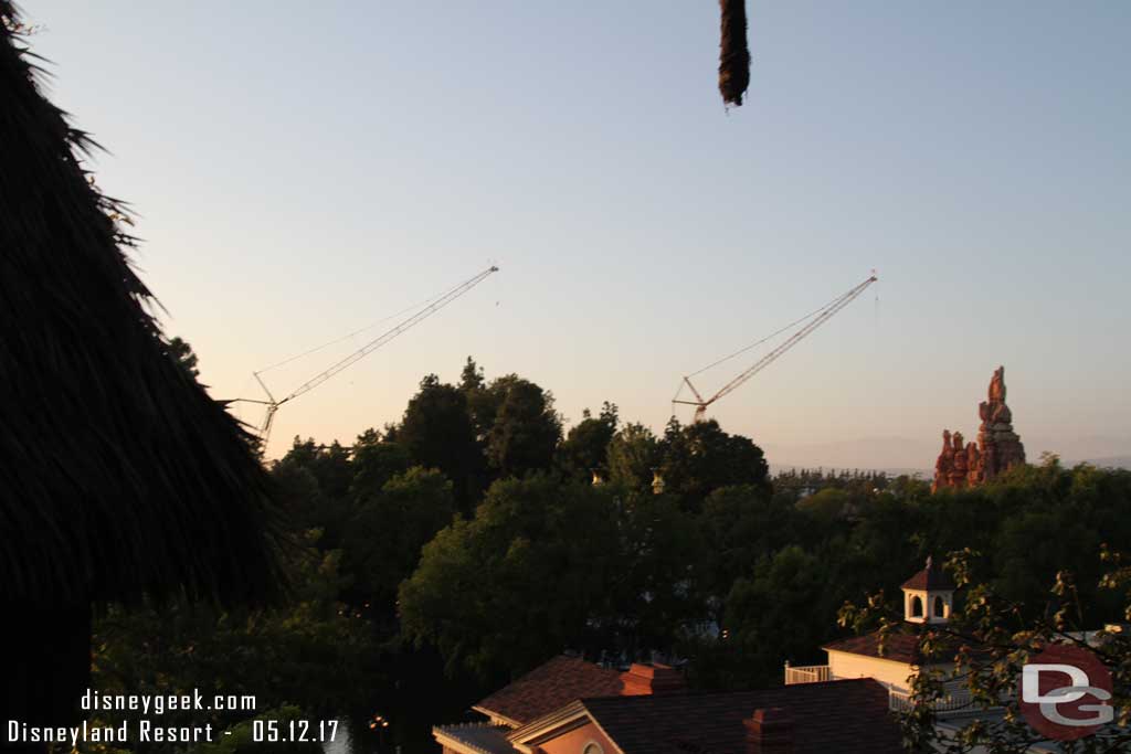 5.12.17 - From the tree house a better view of the two cranes for the two Star Wars show buildings.