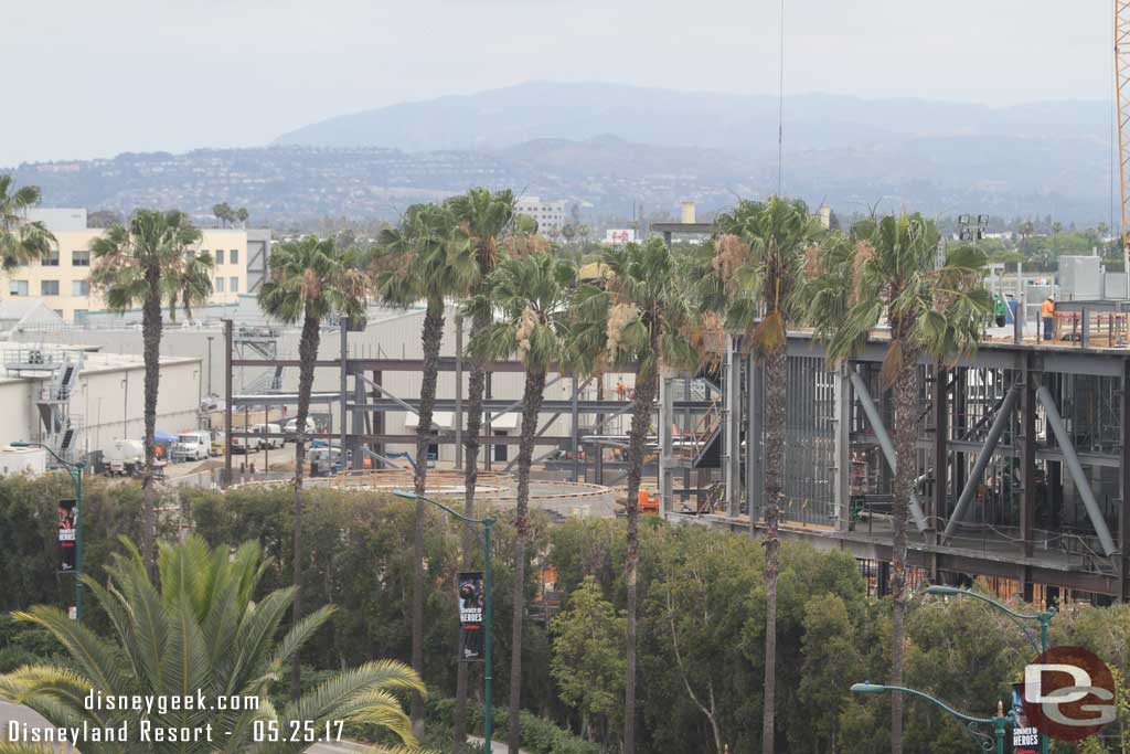5.25.17 - A wider view of the Millennium Falcon attraction building in the background.  More steel is going up on the far side.