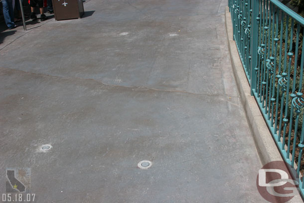 05.18.07 - As you walk around the lagoon you can see the holes for the extended queue, which runs all the way to the old smoking area (I heard its going to extend all the way to the Small World Mall if needed