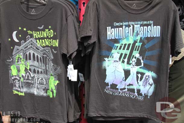 A couple shirts I do not remember seeing before on the cart near the Haunted Mansion.