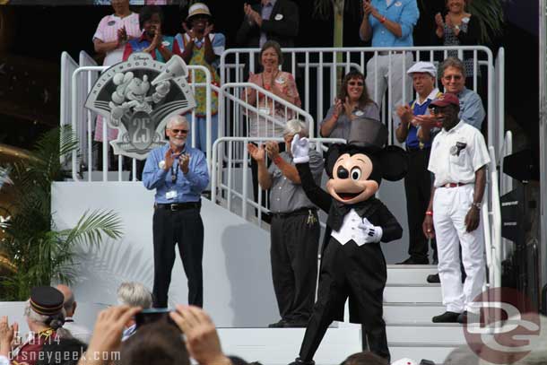 Mickey sporting formal attire for the event.