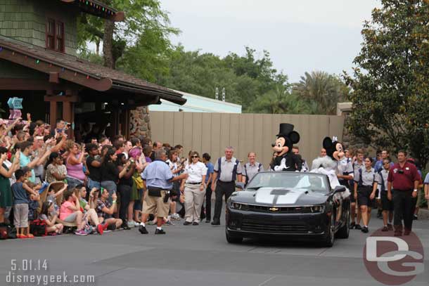 Mickey and Minnie are in the final car -  Stars of the Studios Motorcade