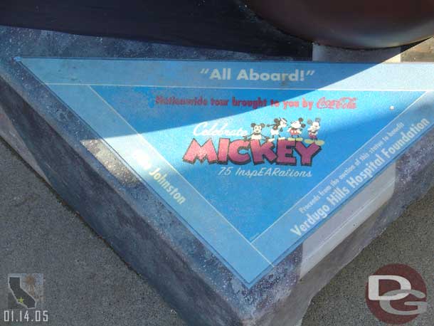 Every Mickey has a nameplate in the lower right corner with its name, who designed it and its charity.