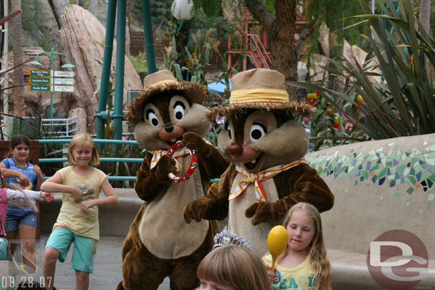 Chip and Dale in their farmer outfits