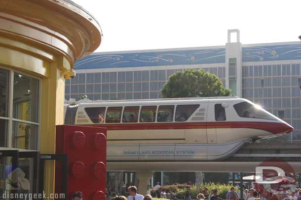 Now some random shots of the Monorails around the resort, here passing by the Lego store at Downtown Disney.