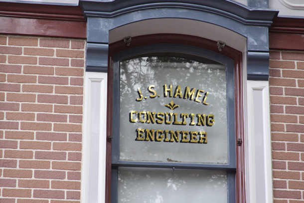 Location: Bank of Main Street<BR>
Inscription: J.S. Hamel - Consulting Engineer<BR>
Information: J. S. Hamel was a civil and electrical engineer that helped to build Disneyland