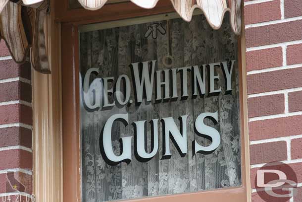 Location: Market House <BR>
Inscription: Geo. Whitney Guns<BR>
Information:  George Whitney - Member of original design team and then became manager of Fantasyland.