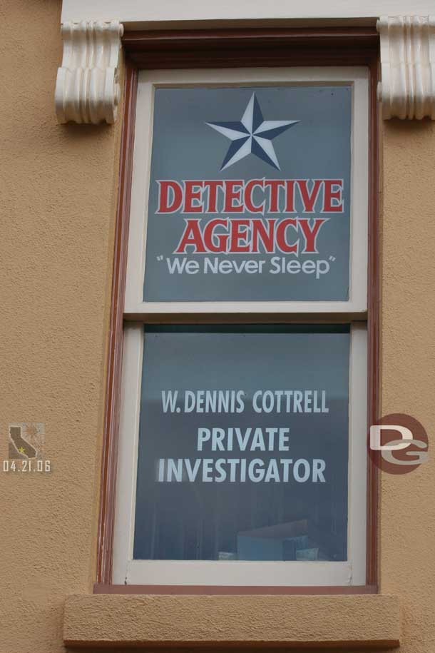 Location: Market House <BR>
Inscription: W. Dennis Cottrell, Detective Agency, Private Investigator. We Never Sleep<BR>
Information:  W. Dennis Cottrell - President of WED/WDI when Disneyland opened