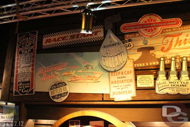 03.02.12 - The area above the two desks features signs from Cars Land.