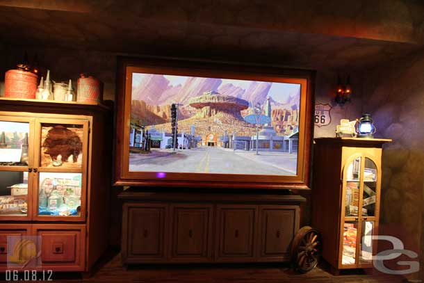 06.08.12 - Today the screen was showing a time lapse of the evolution of Radiator Springs.  Starting next week a Mater Tall Tale will be shown.
