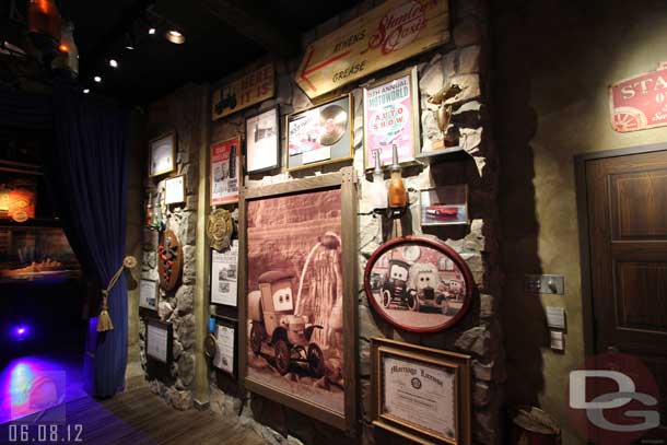 06.08.12 - The left hand wall pays tribute to the citizens of Radiator Springs and shares some of their backstories.