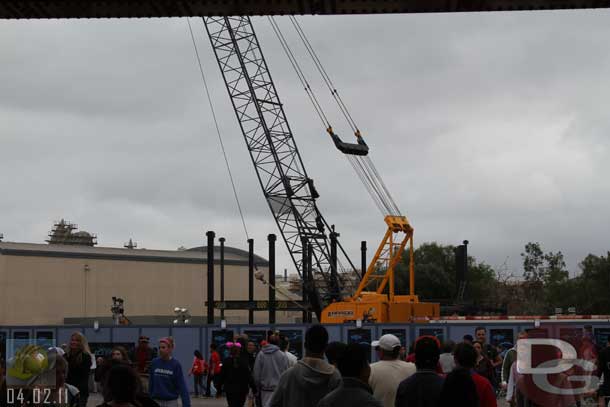 04.02.11 - Upon entering the park the ElecTRONica stage is gone and a crane is there now.  The Carthay Circle theater steel is going up.