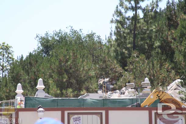 06.24.11 - The pump house is taking shape behind the walls (and tarps)