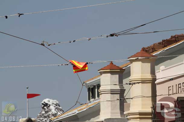 04.06.12 - The cables/wire run down the street.  There are flags on them to assist the work crews in seeing them.