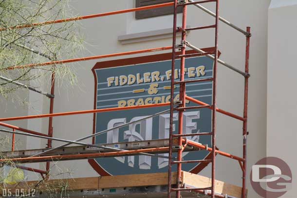 05.05.12 - A sign for the Cafe was being hand painted on the side of the building.
