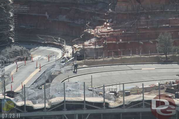 07.23.11 - A worker checking out the rockwork mesh.