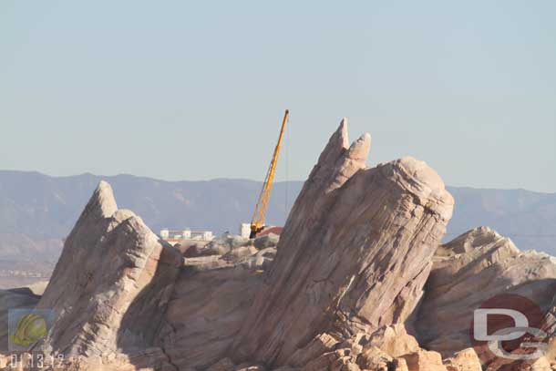 01.13.12 - A crane working on the backside of the mountain range.