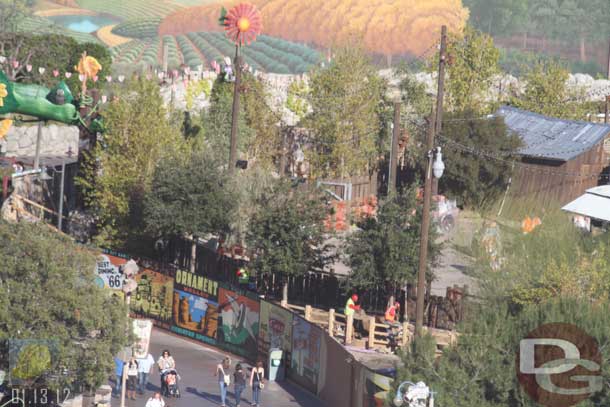 01.13.12 - A crew working on the landscaping between the two fences of Maters