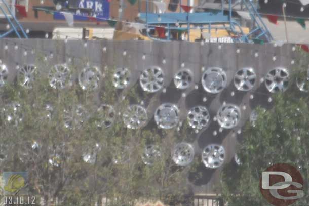 03.10.12 - A wall of rims on the backside of the Flying Tires.