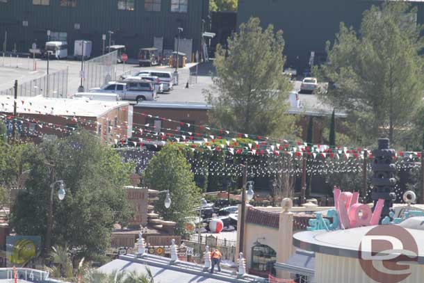 04.14.12 - A crew working on the neon on Flos, in the background you can see some beach balls in with the Flying Tires, but no testing going on this morning.