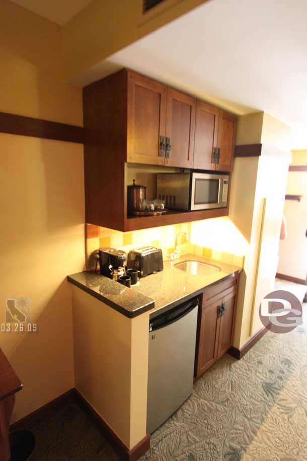 03.26.09 - There is a kitchenette with microwave, refrigerator, coffeemaker, and wet bar