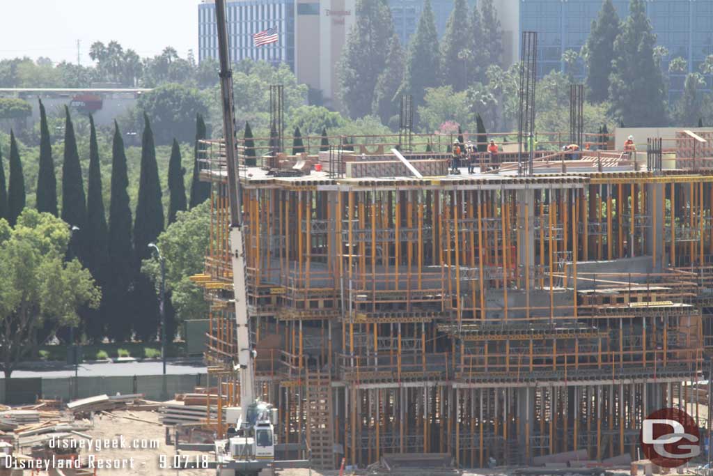 09.07.18 - The escalator structure is rising quickly with workers on what appears to be the 5th floor.