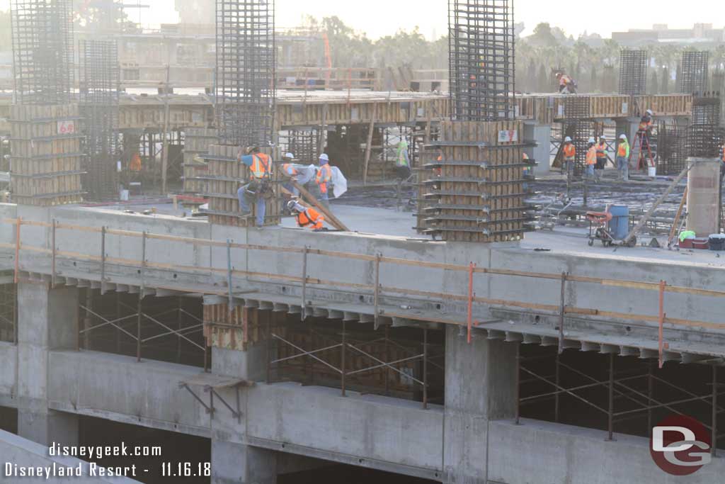 11.16.18 - In the foreground a team working forums for the columns for the 5th floor, in the background the concrete pour 