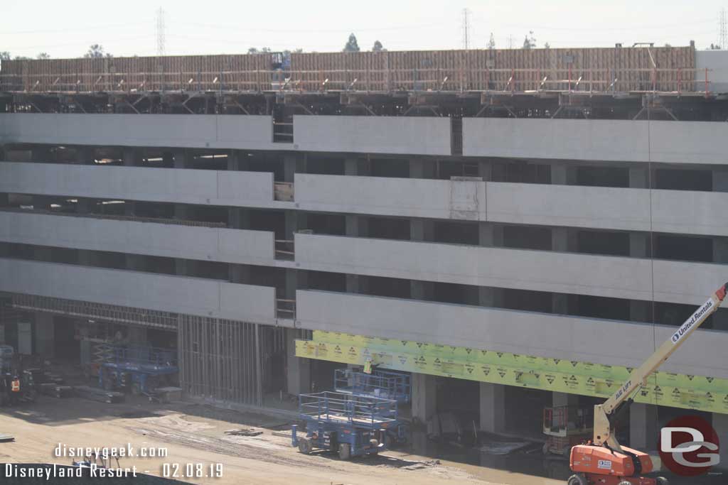 02.08.19 - Further to the right on the ground level installation of the facade is underway.