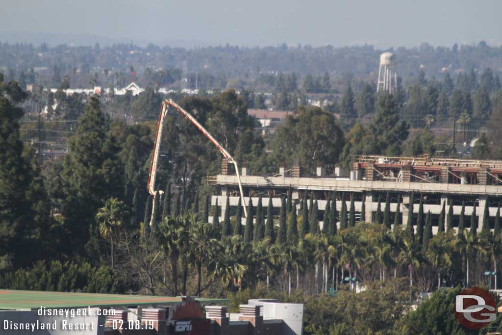 02.08.19 - From the Pixar Pal-A-Round you can see the concrete boom.  Notice the furthest corner from the tram stop has support columns for the roof level rising up but no forms yet for it.