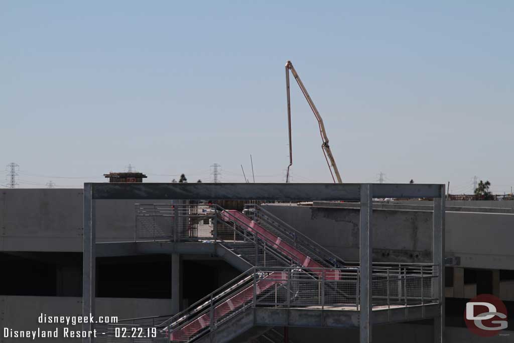 02.22.19 - In the background the boom for a concrete pumper.  They were working on the roof level in the back section.