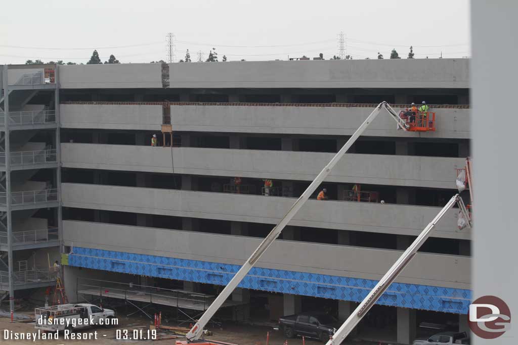 03.01.19 - Crews preparing the side facing the tram stop for decorative elements.