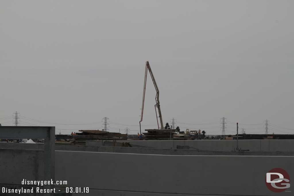 03.01.19 - A concrete pumper working on the far side of the garage.