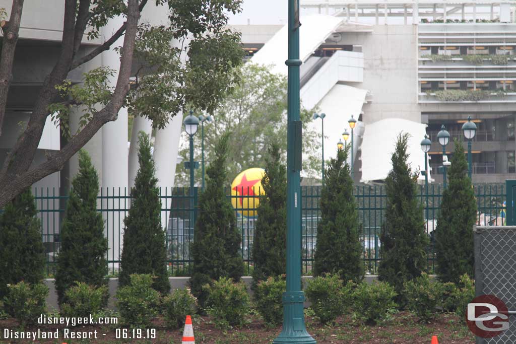 06.19.19 - The Pixar ball is visible through the trees.