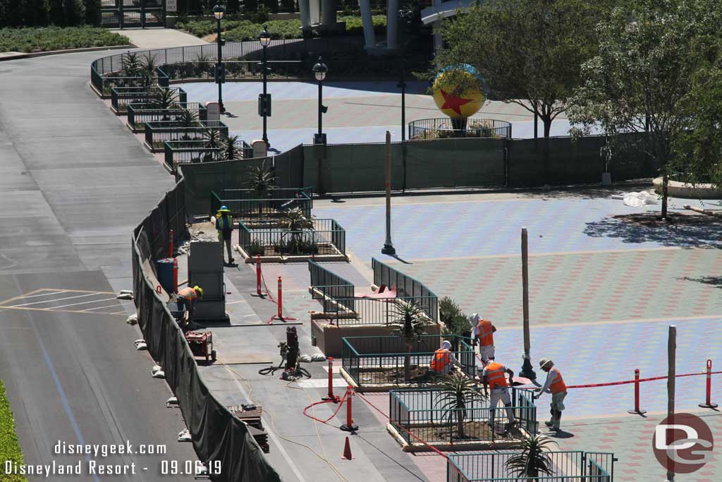 09.06.19 - The tram stop is almost complete.  Plants and railings are in. They are installing the bridge to the tram from the ramp.