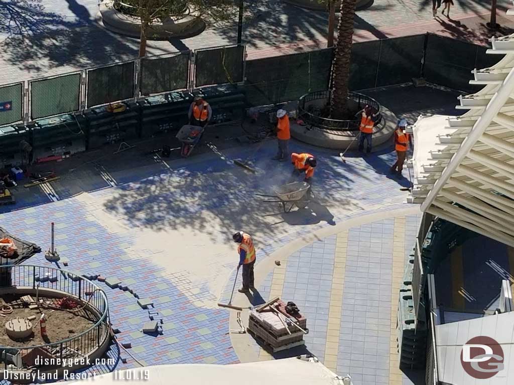 11.01.19 - Adding sand to lock in the pavers.