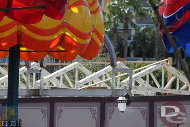 03.25.11 - The roof structure is being installed over the dining area along the parade route (the arches we sa)