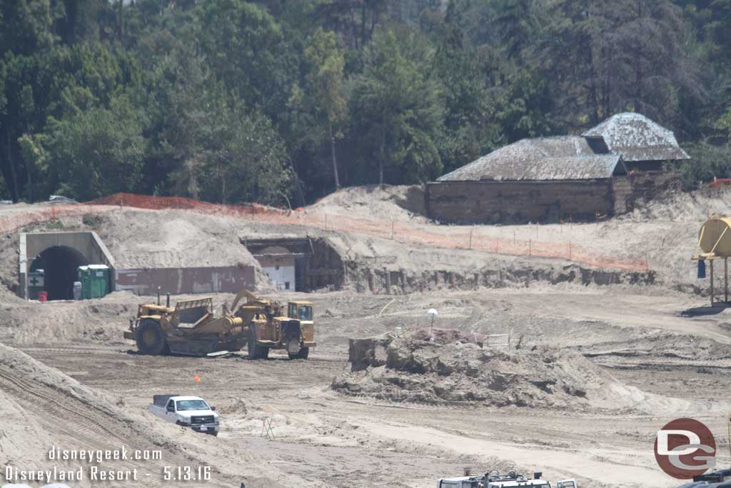 5.13.16 - There were several earth movers taking dirt that used to be the berm and river area and moving it to the mound.