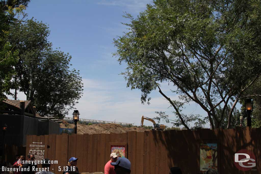 5.13.16 - Continuing up the trail you can see the shovel at work above the fence