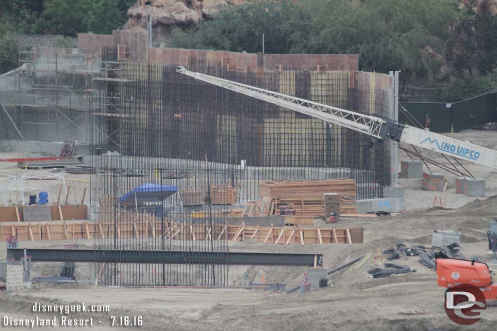 7.16.16 - Moving back to the center of the site and the bridge structure taking shape. in the forground and a wall in the background along the Big Thunder trail.