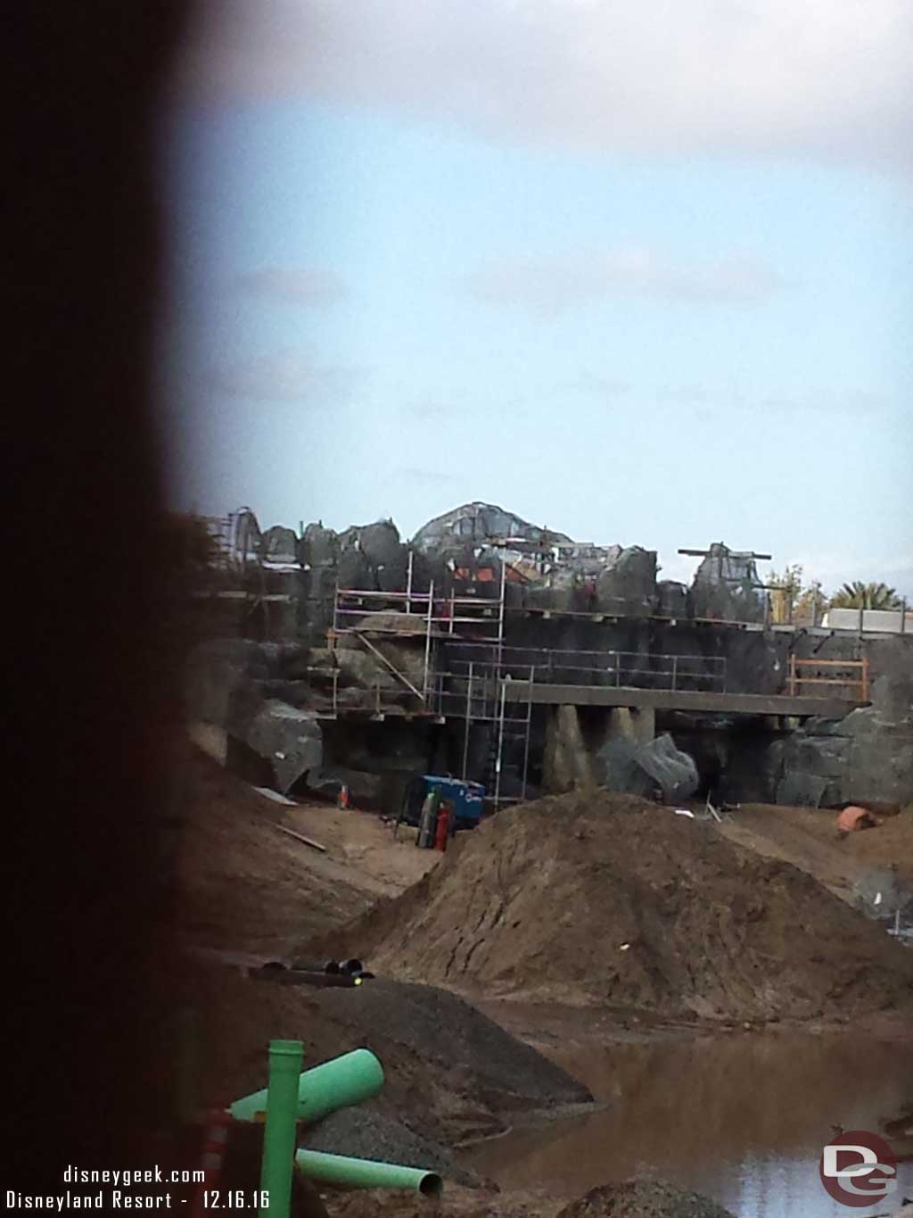 12.16.16 - Looking through the fence at the rock formations taking shape.