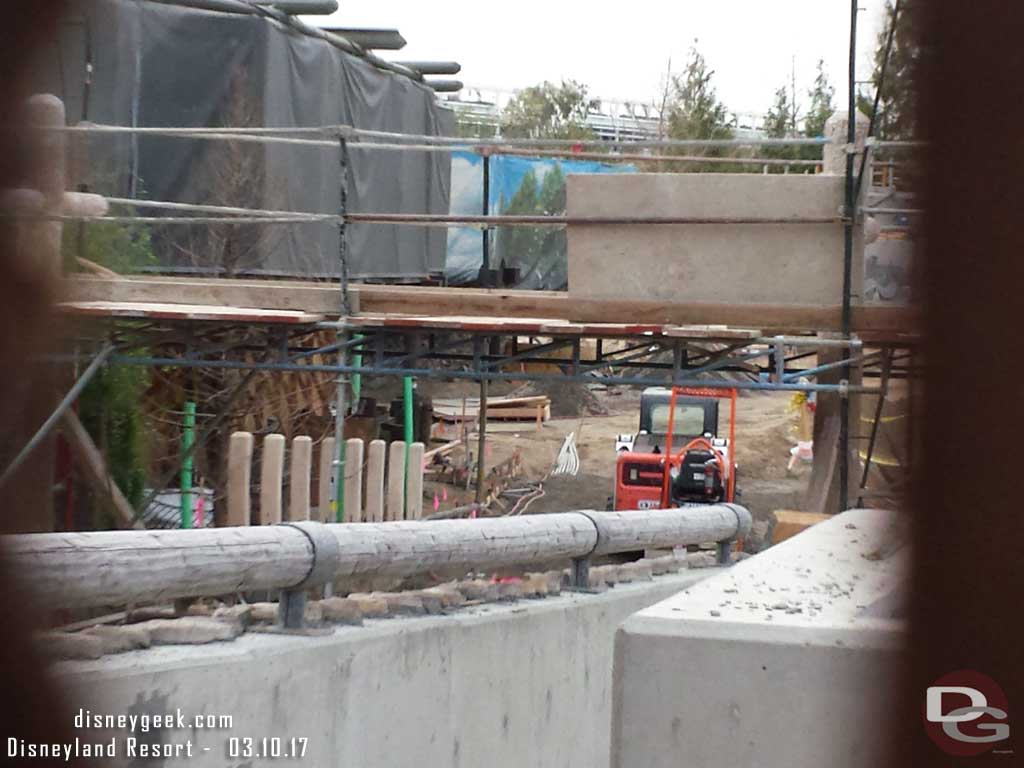 3.10.17 - Looking through the fence (no one in the way this week).  The new walkway is moving along.  Something being constructed over it.