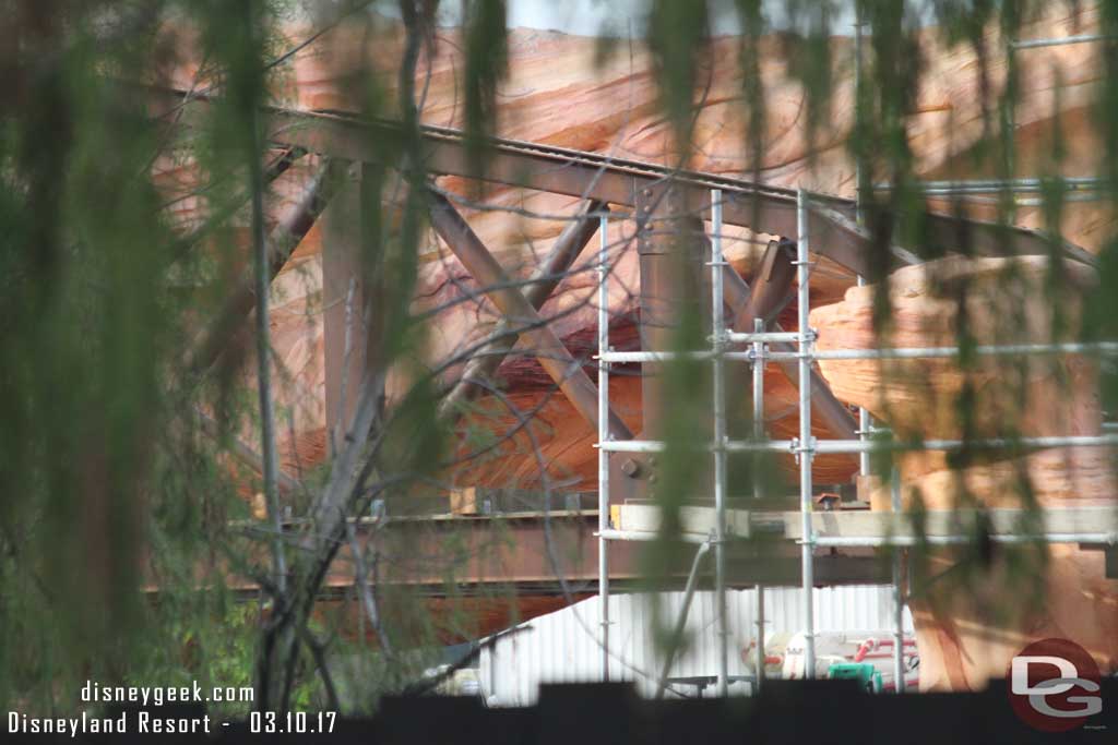 3.10.17 - Moving to the right hand side a closer look at where the trestle meets the rocks.  And beyond it the entrance. Looks like a rock covered archway like Cars Land has.