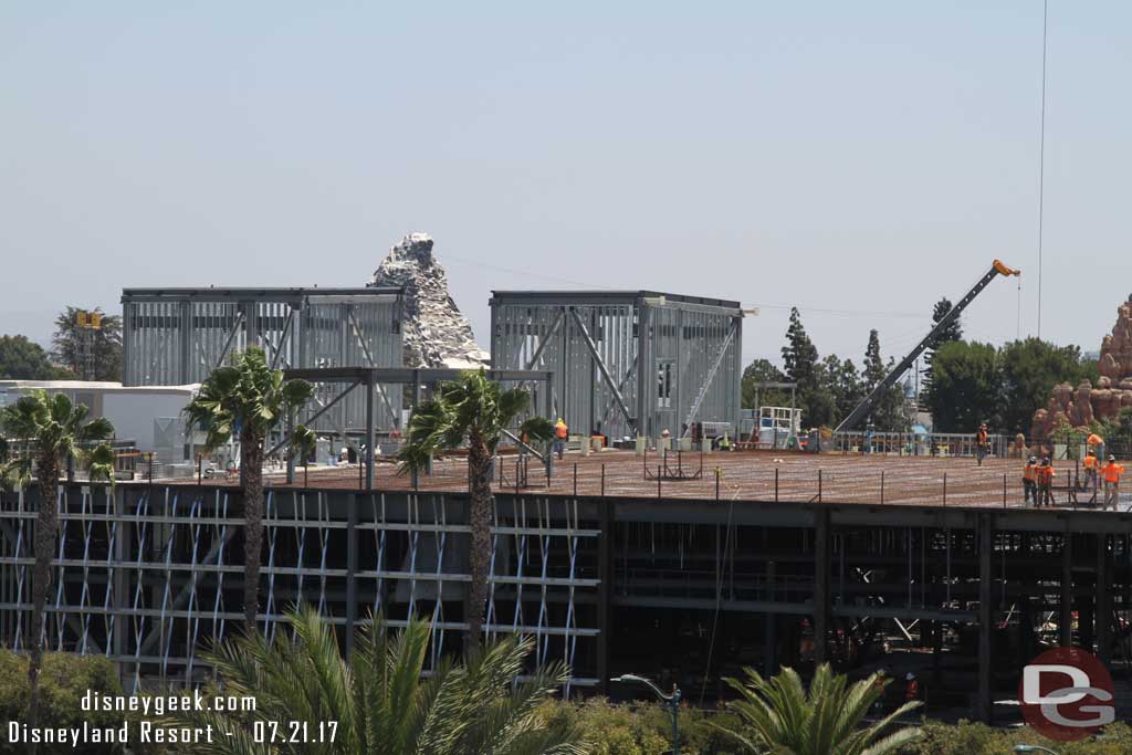 7.21.17 - Panning to the right to the Battle Escape show building where the next section of roof is being prepared for concrete.