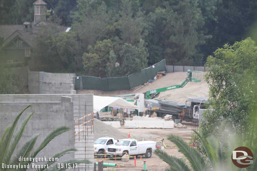 9.15.17 - The wall has not been completed yet from the concrete structure going to the right.  In the distance looks to be a truck with more fencing for something.