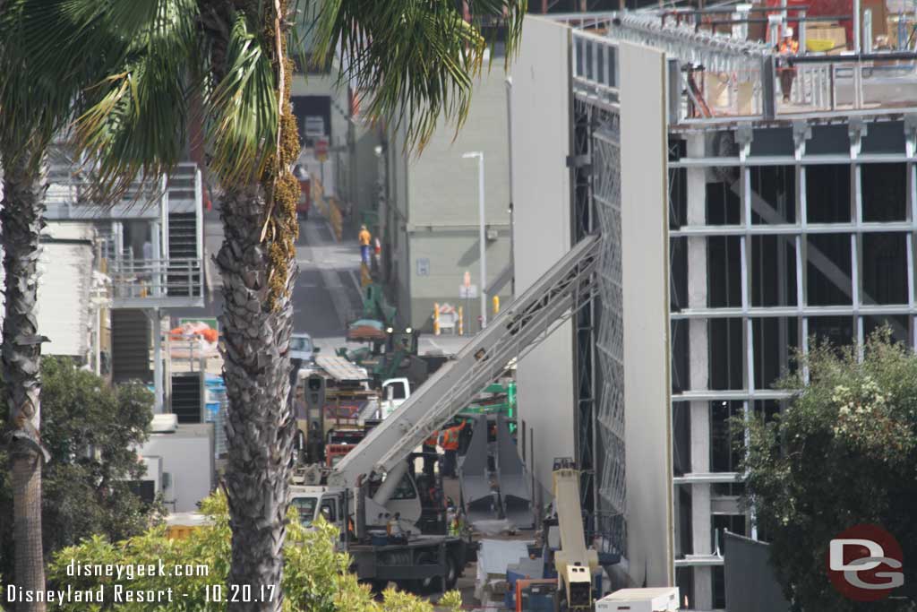 10.20.17 - A crane lifting something inside the building.