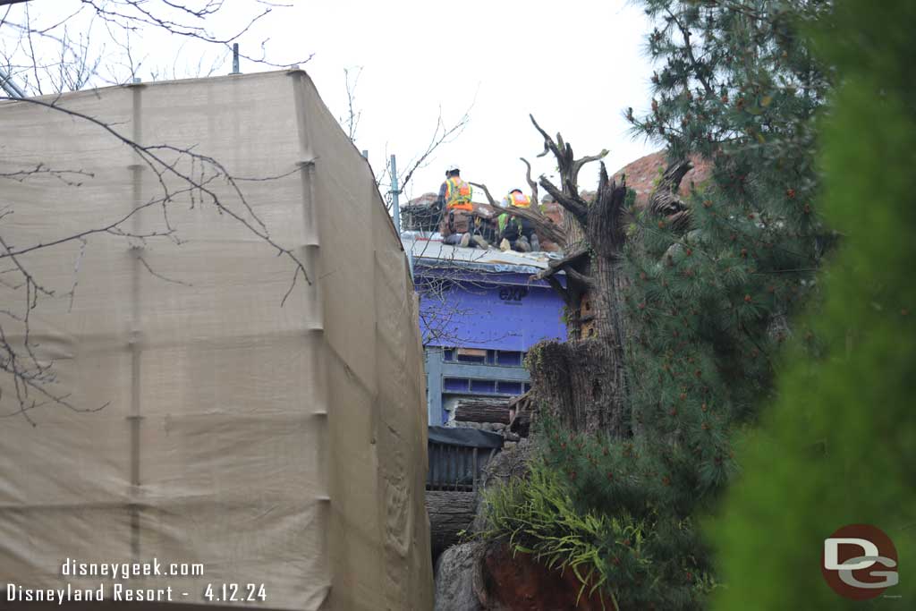 4.12.24 - A team working on enclosing a portion of the flume.