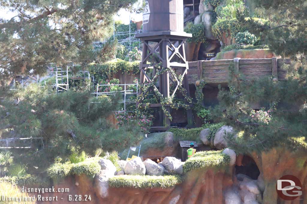 6.28.24 - A worker walking the flume.