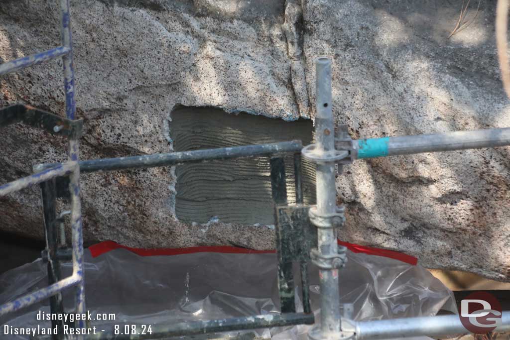 8.08.24 - The hole is being patched up in the rock work.