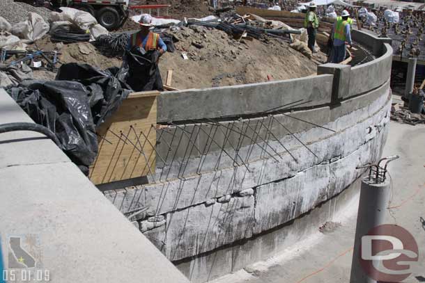 05.01.09 - They were pulling a cover over the new wall as they wrapped up their work in the area